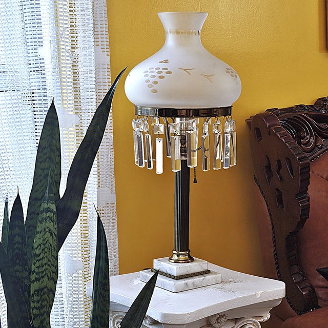 Striking vintage interpretation of a 19th-century Sinumbra/Astral lamp, featuring a fluted dark bronze/brass-tone column...