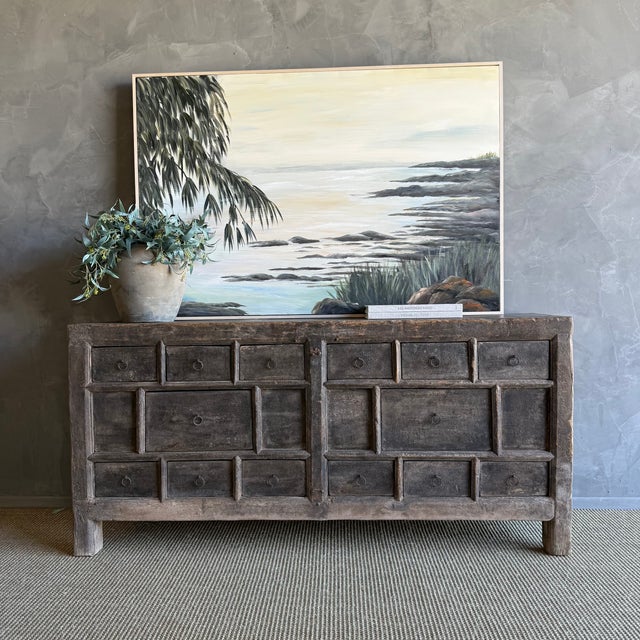 This charming vintage elm wood cabinet is a one-of-a-kind piece with beautiful age and patina that adds character to any...