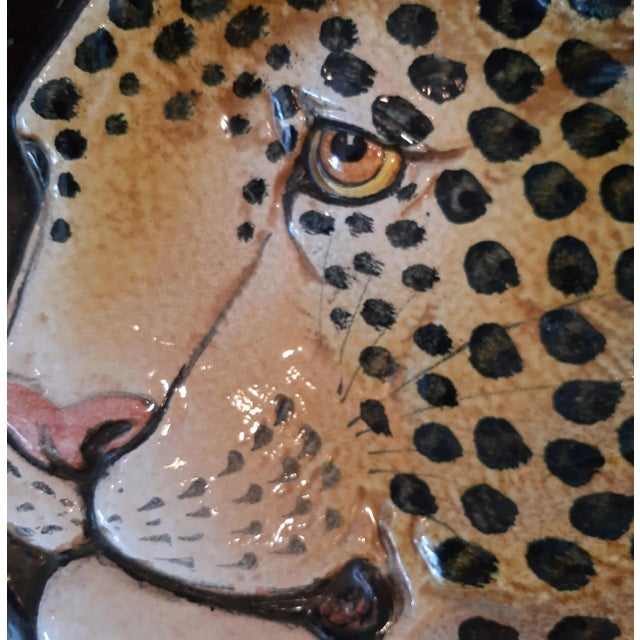 Gorgeously painted Majolica pottery leopard head bowl. This piece is a solid heavy piece and hand painted with remarkably...