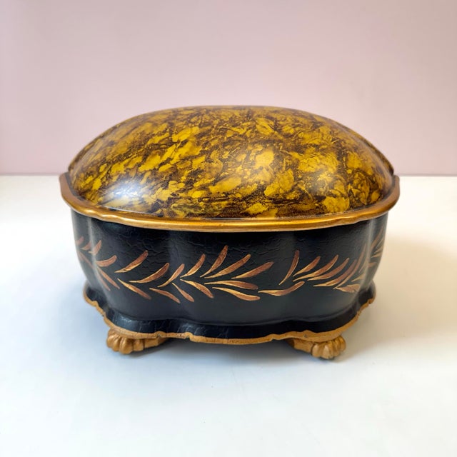 A sensational, large and impressive heavy wooden box with faux tortoise shell hinged lid and hand-painted gold toned...