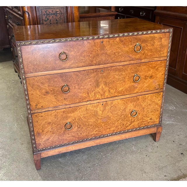 Beautiful antique burlwood chest. European origin with banded and bookmatched burlwood top. Three hand dovetailed drawers...