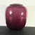 Beautiful plum color glass vase with rolled over rim. Classic 70s' home design. Rich color and wonderful weight and feel...