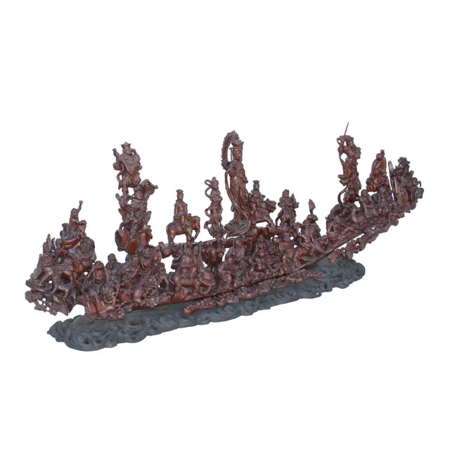 This one of the kind, large size sculpture is hand-carved with solid Huali rosewood. It has the status of Guan Yin...