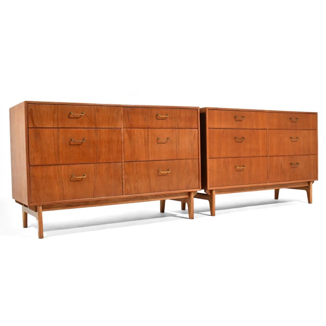 These beautiful Danish modern dressers in teak and oak by Torben Strandgaard were finely crafted by Møbelfabriken Falster...