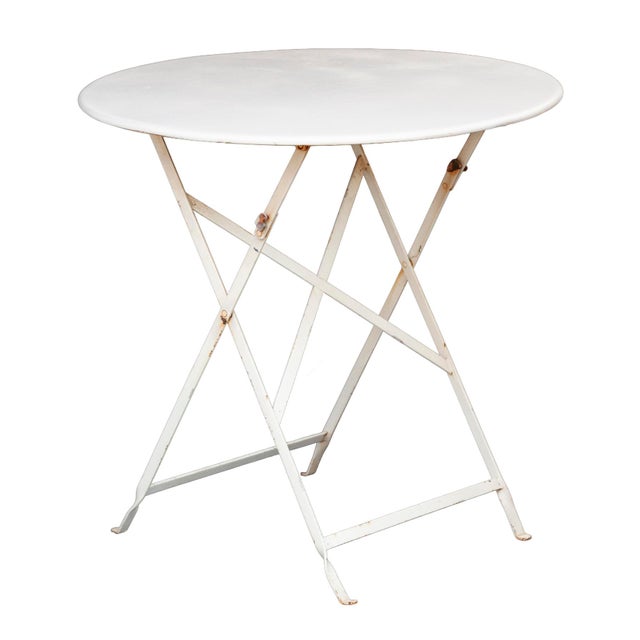 A Lovely Vintage French Metal Folding Garden Table in White. A great size for a balcony or other Outdoor Spaces.