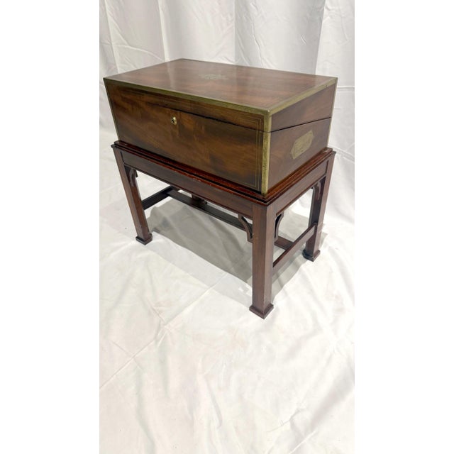 Circa 1870s English campaign lap desk, elegantly crafted from rich rosewood and now paired with a custom-made side table...