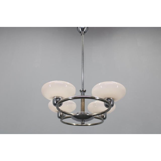 - cleaned and rewired - 4x , e26-e27 bulb - us wiring compatible - minor signs of use this piece is attributed to the...