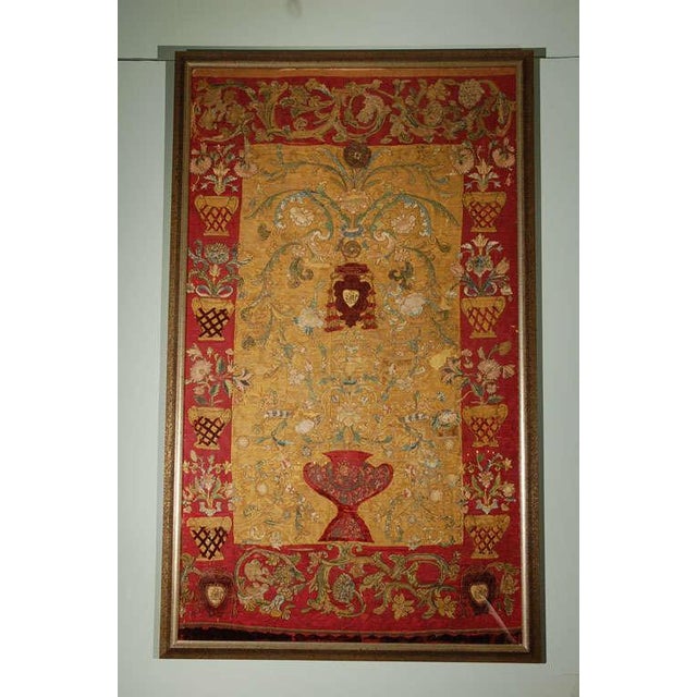 An extraordinary and richly ornamented Italian silk embroidery panel, dating to the late 17th or early 18th century,...