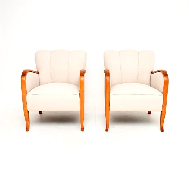 A very stylish and extremely well made pair of Swedish Art Deco armchairs in Satin Birch. They were recently imported from...