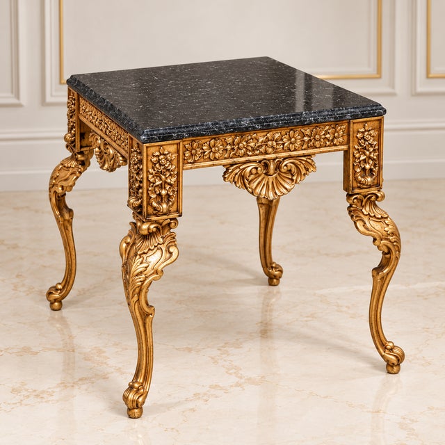 Make a sophisticated statement with this substantial French-style side table, featuring a square black marble top and an...