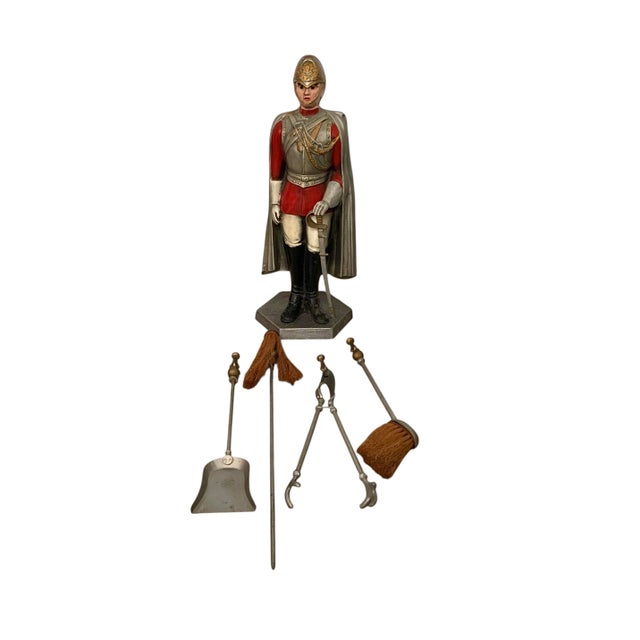 Vintage-inspired Royal Knight multi-tool fireplace set. English-style butler figure adds old-world hearth charm....