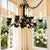 These custom antique lighting fixtures are Spanish Revival style wrought iron chandeliers, characterized by heavy forged...