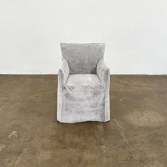 Transform your dining space with this distinguished four-piece armchair collection from Gervasoni's Ghost 25 line....