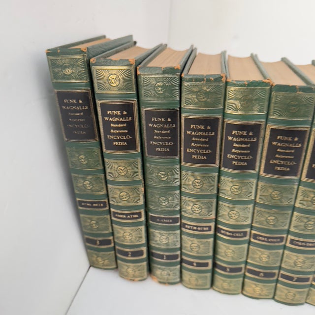A collection of beautifully bound encyclopedias. Dated to 1962. Funk and Wagnalls Standard Reference Encyclopedia by...