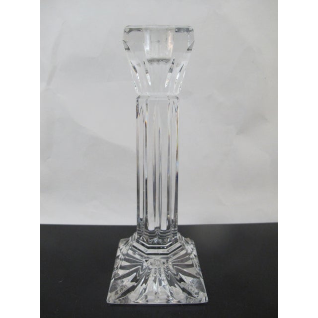 Beautiful Waterford crystal single candlestick. Measures 8" tall x 3". Hallmark at base. Excellent condition, on chips,...