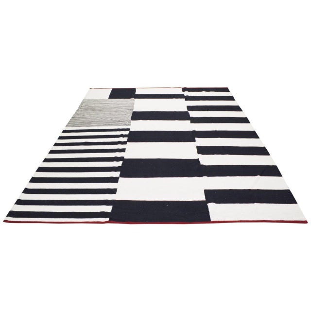 Afghan Modern Flatweave Kilim with care using traditional rug-making techniques, this wool rug blends timeless...