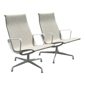 Pair of Eames Aluminum Group Outdoor Swivel Lounge Chair With Arms by Herman Miller