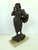 This expressive figurative sculpture is “La Tamborella” (1907) by Italian sculptor Gabriele Parente, a refined example of...