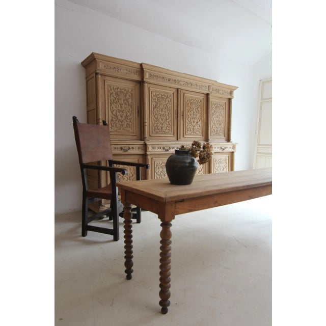 Exceptionally large buffet cabinet from the late 19th century. Solidly crafted in oak with bleached surface. Two-piece...