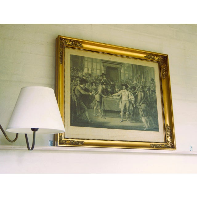 Large early 19th century engraving in neo-classical gold frame with ornate corners. Historical scenery of "Oliver Cromwell...