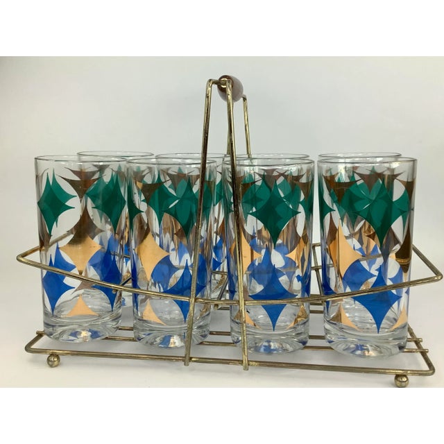 Set of 8 Vintage Highball Glasses With Blue, Green, and Gold Diamonds with Metal Caddy with Wooden Handle. Glasses measure...