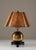 Charming art deco table lamp manufactured by Corona, Sweden, 1930s. The lamp consists of a large brass sphere with a round...
