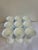 A beautiful set of nine vintage white milk glass pedestal goblets featuring an embossed grape and vine motif. Raised...