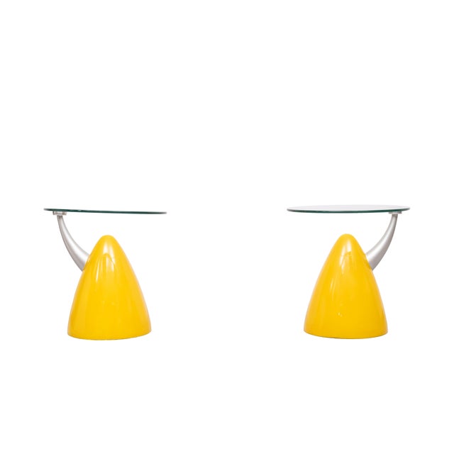 Stunning set of Space Ace side tables. Bright Yellow Fiber Glass bullet-shaped base, comes with a thick Glass top. Ideal...
