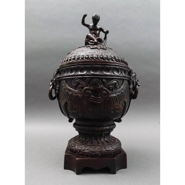 Maitland Smith Vintage Bronze Cherub Lidded Large Urn Compote With Lion Handles . Measures approximately 10 1/2" long, 8"...