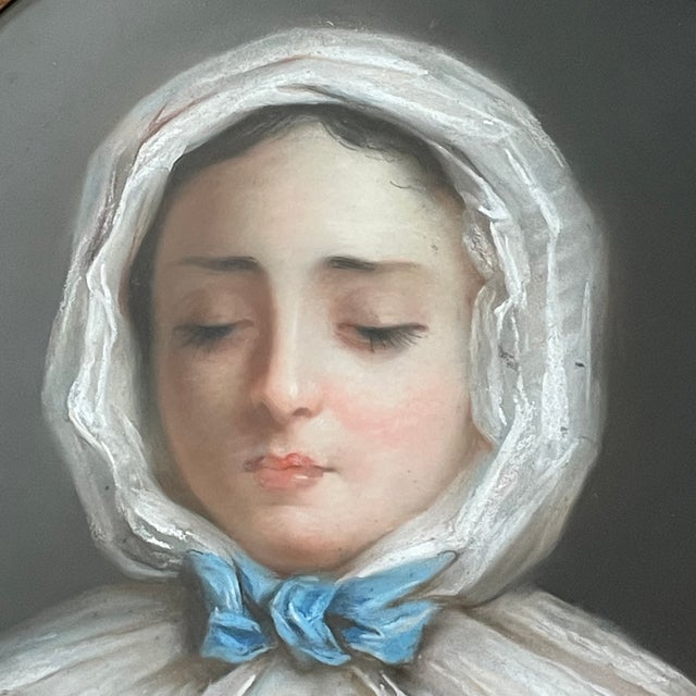 A wonderful portrait of a young girl knitting in the 19th century, imbued with sweetness and delicacy. Exquisitely crafted...