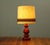 A red ceramic table lamp by Hustadt Leuchten in very good original condition with a subtle patina. A small lamp with...