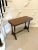 Antique Victorian quality walnut side/lamp table having a quality walnut top with a moulded edge supported by turned...