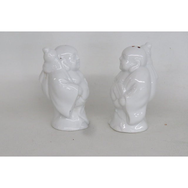 Japanese Mid 20th Century White Ceramic Salt and Pepper Shakers 2pc Pair Laughing Buddha Figurines For Sale - Image 3 of 10