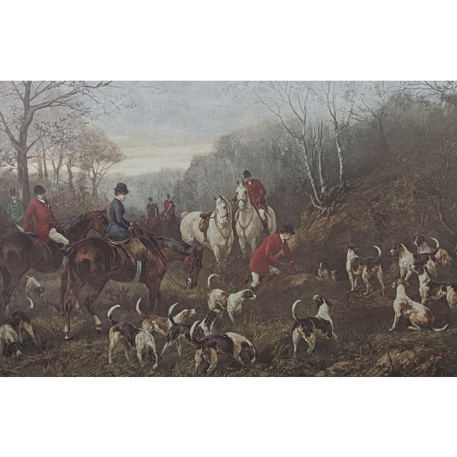 A large vintage equestrian lithographic print titled “Run to Earth,” after the work of noted British sporting artist...