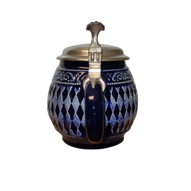 Beautiful pot belly beer stein by Marzi & Remy of West Germany. Post-war modernist design in deep cobalt blue with pewter...