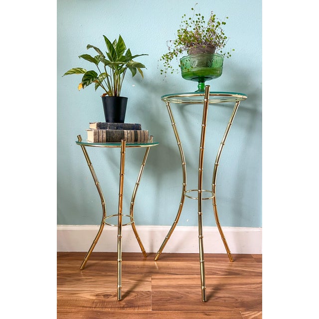 Tall vintage plant stand featuring a sculptural faux-bamboo frame in a polished brass-tone finish with a removable round...