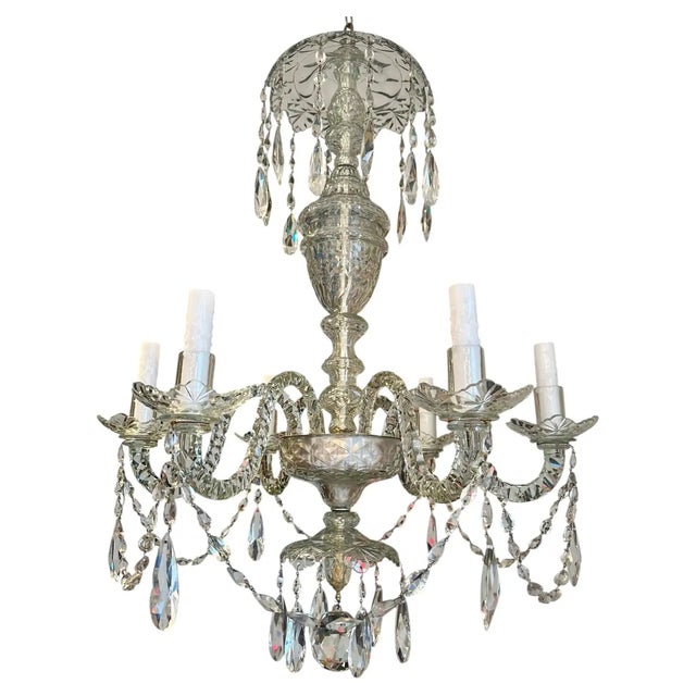 Pair of Late 19th Century Irish Georgian Style Cut Crystal Chandeliers. Beautifully cut matched pair of George III Six...