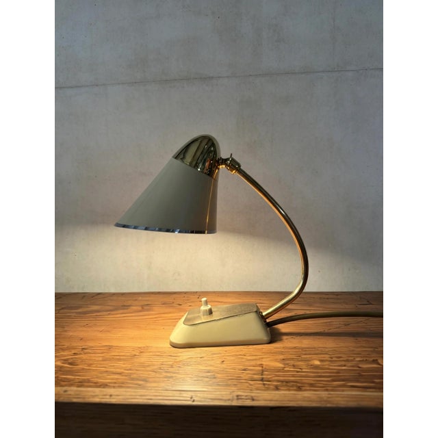 1940s german modernist table lamp. A very of its era design. completely original, classic bakelite & brass base. Brass...