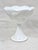 Vintage milk glass scalloped footed bowl/compote. Features a grape vine design. Perfect to use with candies or fruits. But...