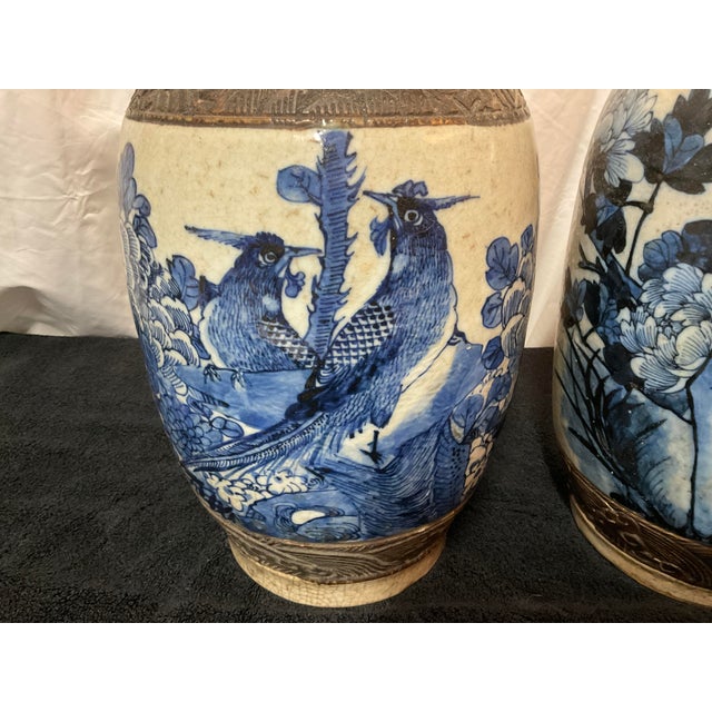 This is a pair of exquisite blue and white 19th century vases that are strong attention getters. Stand alone, as a pair or...