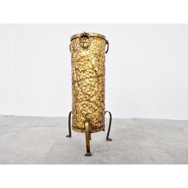 Attractive tripod hammered copper umbrella stand. in the style of Rene Drouet. Good condition, nice patina. 1960s -...