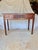 Found in the Provence Region of France, this 19th Century Louis XVI Walnut Console Table dates back to the late 1800's....