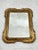 Mid-Century French mirror with gilt wood frame, 1930s The mirror has a patina of age and the frame has some cracks....
