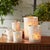 Add a soft, sophisticated glow to any space with this set of three etched glass votive holders. Featuring a delicate...