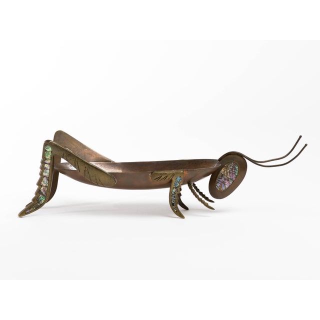 Hand-wrought circa 1960s copper and brass grasshopper centerpiece sculpture with abalone inlay eyes and legs. Signed...