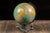 c. 1948-1952; Weber Costello Co. - Chicago Heights, IL 12" terrestrial globe mounted on a cast-metal airplane base with a...