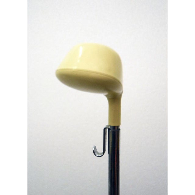 Coat stand/umbrella stand 'Drive' produced by Velca in the 1970s. Painted metal base on wheels with plastic umbrella stand...