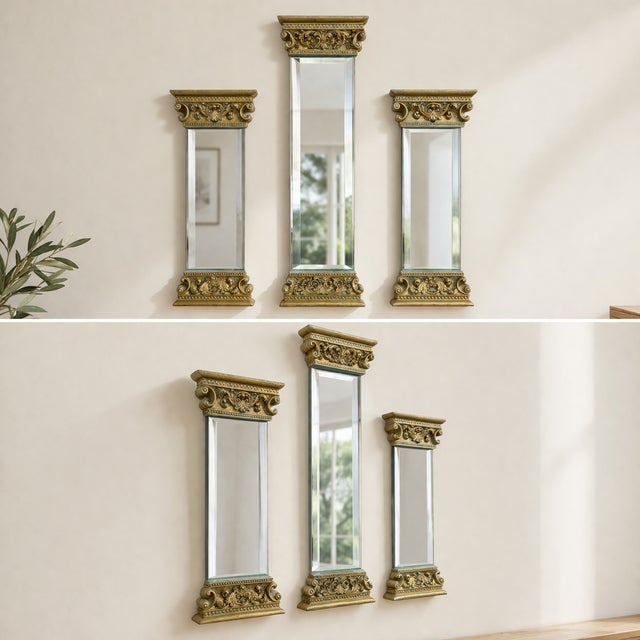Elegant set of three vintage wall mirrors designed in the form of classical Corinthian columns. Each features ornate gilt...
