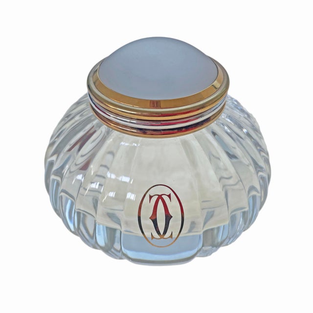 Must de Cartier crystal and silverplate melon-form inkwell. Beautifully proportioned and impeccably crafted, this elegant...