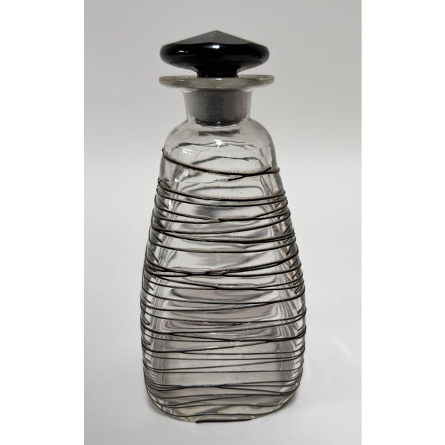 Frederick Carder for Steuben Glass Vanity Bottle, Clear Crystal with Black Threading, circa 1920s. An elegant and highly...